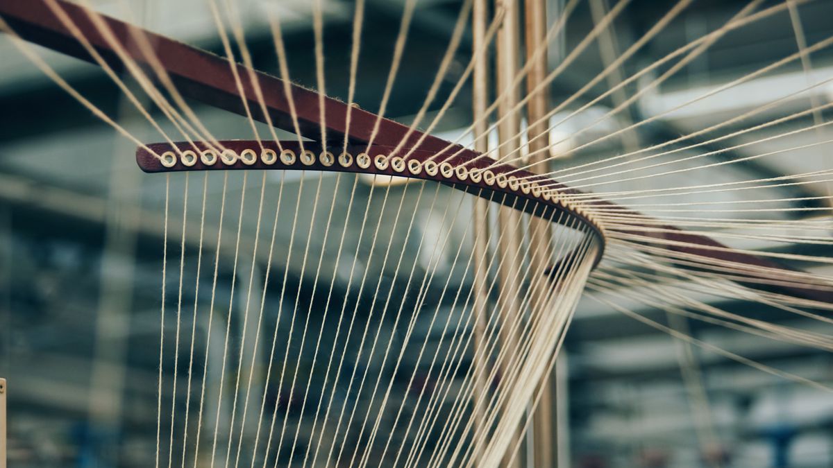 Yarns that have been spun to create threads for fabrics.
